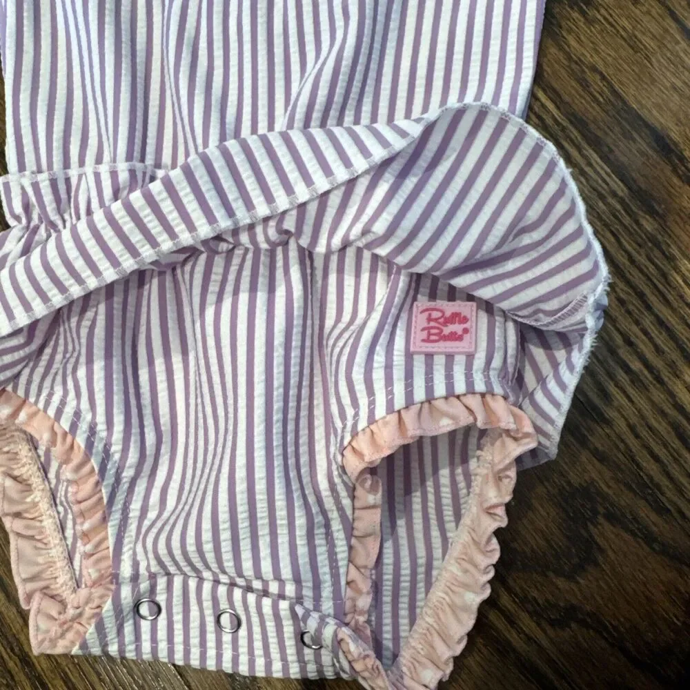 EUC Girls RuffleButts Bathing‎ Suit Purple Stripe With Pink Bow Sz 12-18 Months